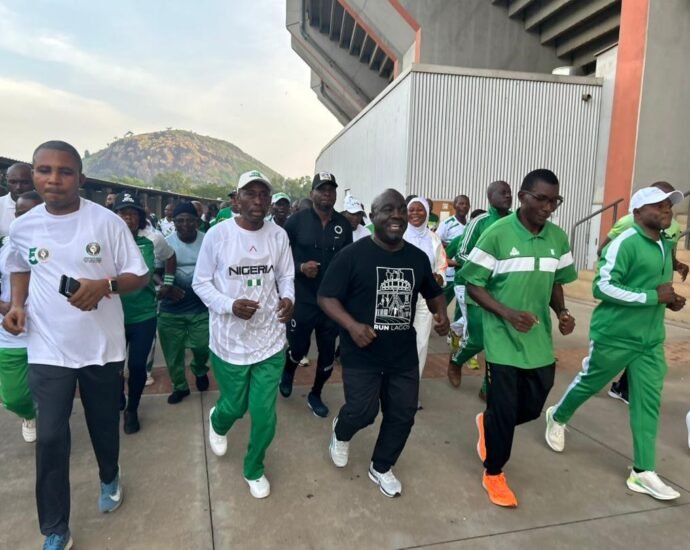 NSC DG Bukola Olopade Rallies Staff for Fitness at stadium in Abuja