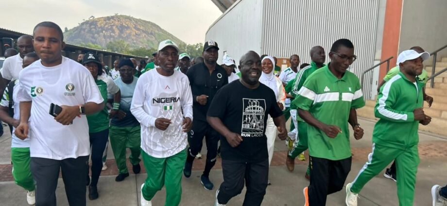 NSC DG Bukola Olopade Rallies Staff for Fitness at stadium in Abuja
